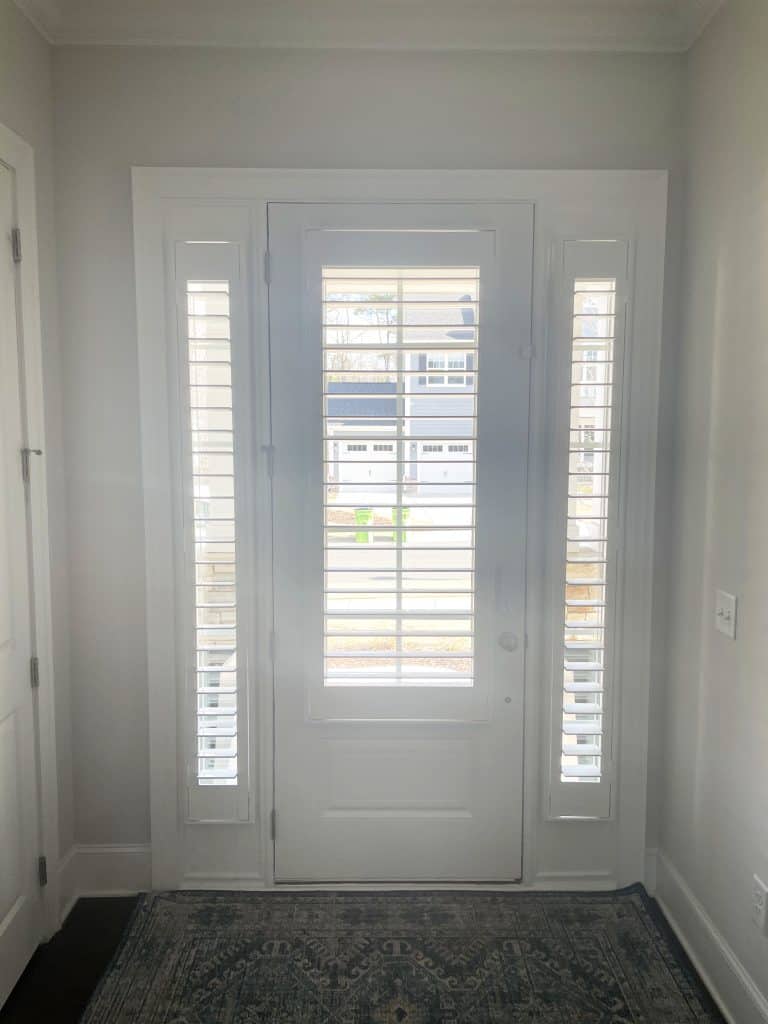White painted wood shutters, 3.5” louvers with clearview, outside mount, no divider rails.