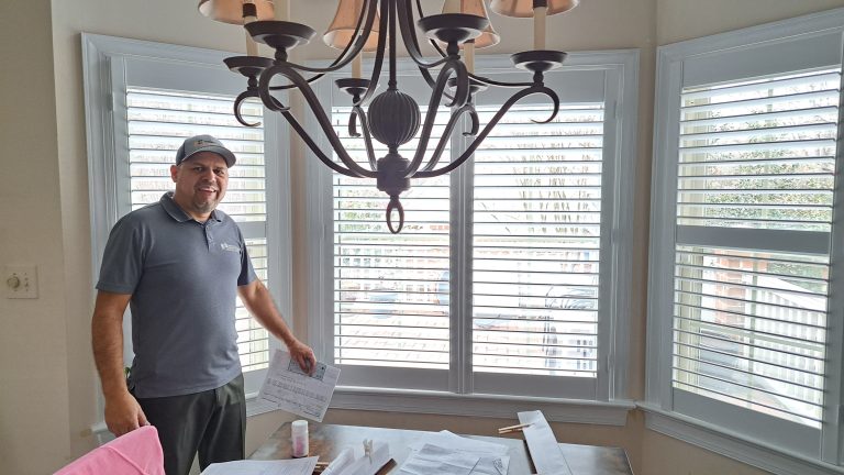 One of our new customers who was so happy with their new shutters they took a picture with our installer Manuel! :)