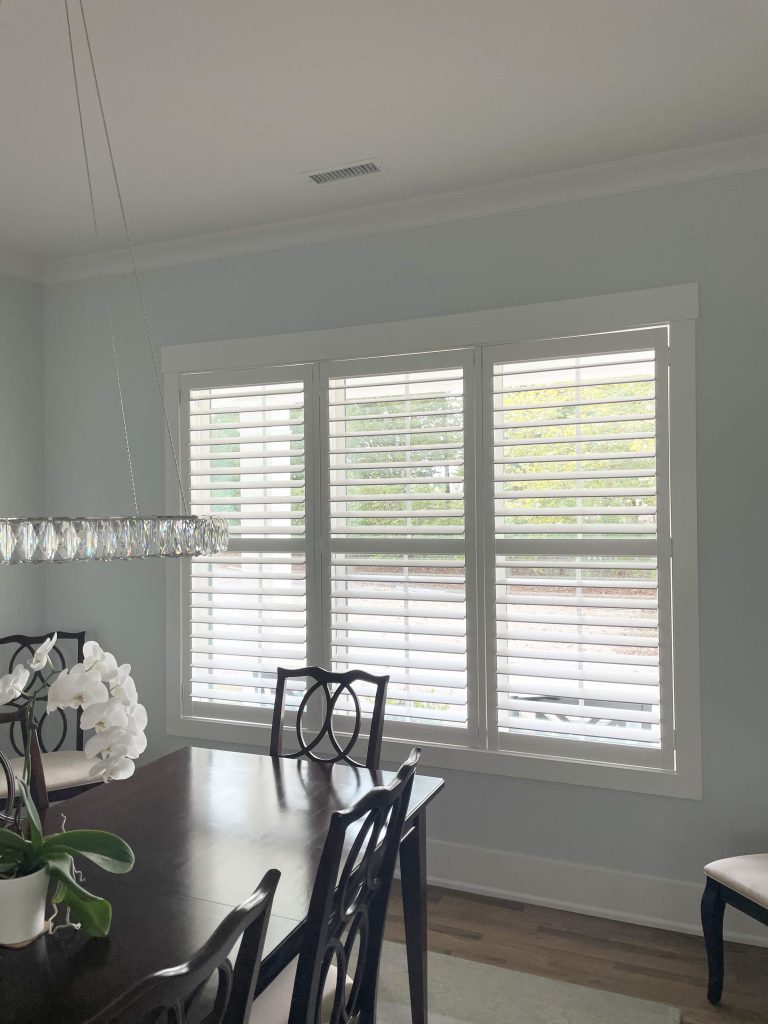 White Painted Plantation Shutters with 3.5 Louvers Clearview Divider Rails